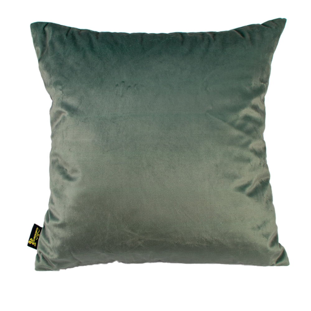 Green pillow with a brand tag on a white background