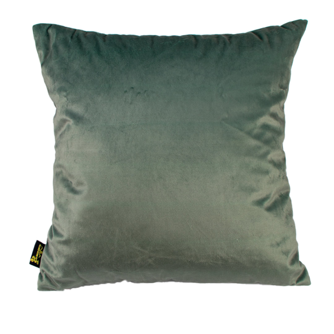 Green pillow with a brand tag on a white background