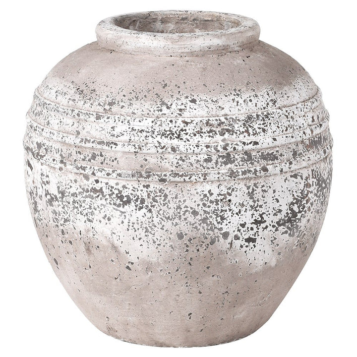Concrete pot with textured surface on a white background