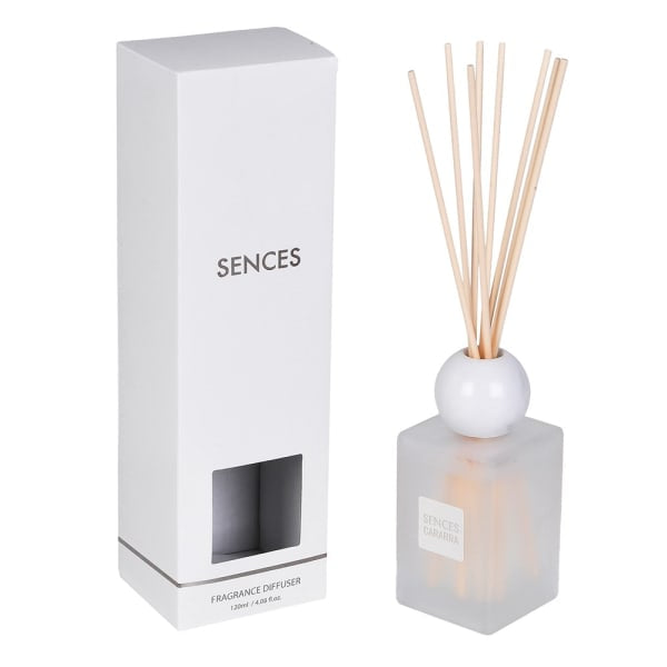 Sences reed diffuser with a frosted glass bottle, white spherical top, natural reed sticks, and its white packaging box on a white background.