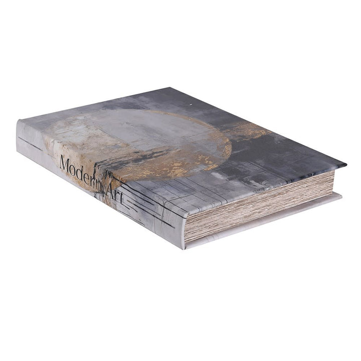 Book with a gray cover and visible text on a white background