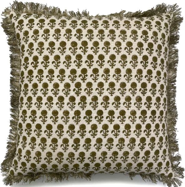 A square throw pillow with a cream-colored woven fabric base, decorated with an all-over olive green floral block print, and finished with fringed edges.