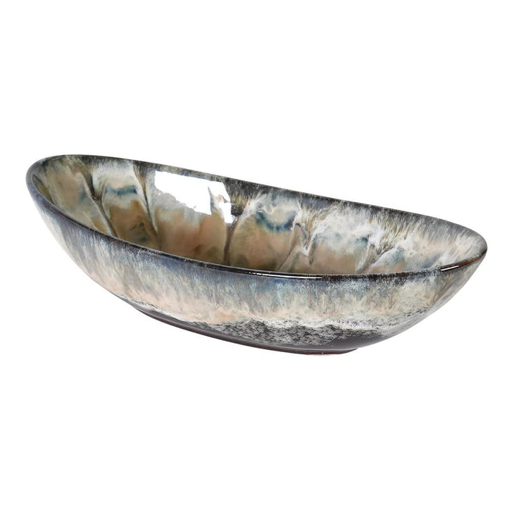 Decorative glass bowl with marbled pattern on a white background
