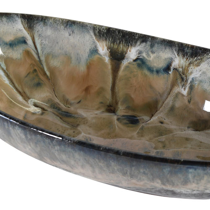 Decorative bowl with a marbled pattern on a white background