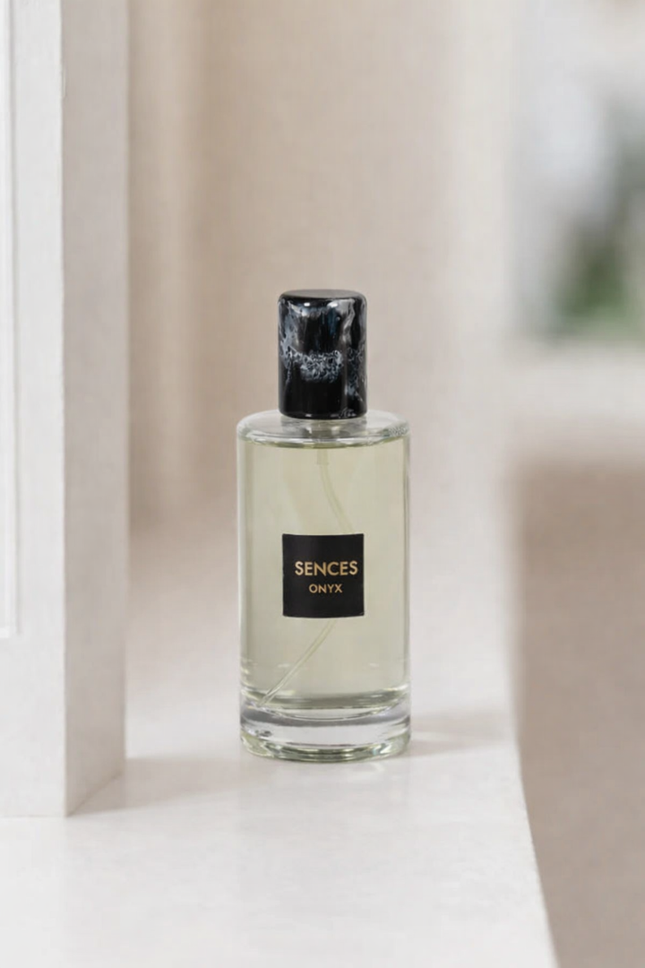 Perfume bottle labeled &