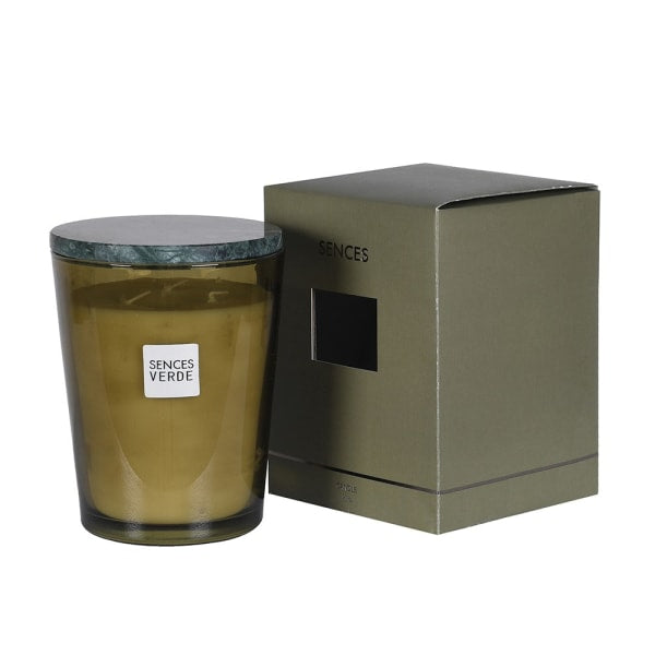 A Senses Verde scented candle in an amber glass jar with a dark green marble-patterned lid, shown next to its olive green packaging box on a white background.