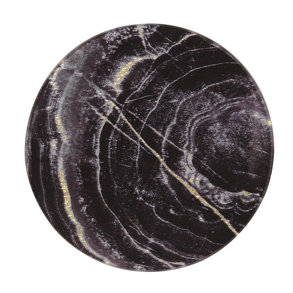 A round black marble-patterned plate with elegant white veining and subtle gold accents, shown from a top-down view on a solid white background.